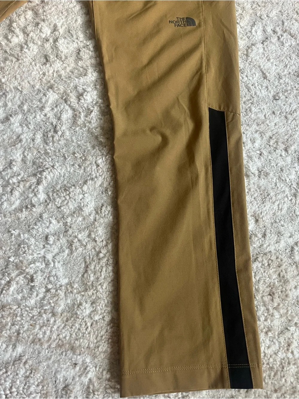 The North Face Men’s ESSENTIAL Track/Running pants in Tan with Black Accents